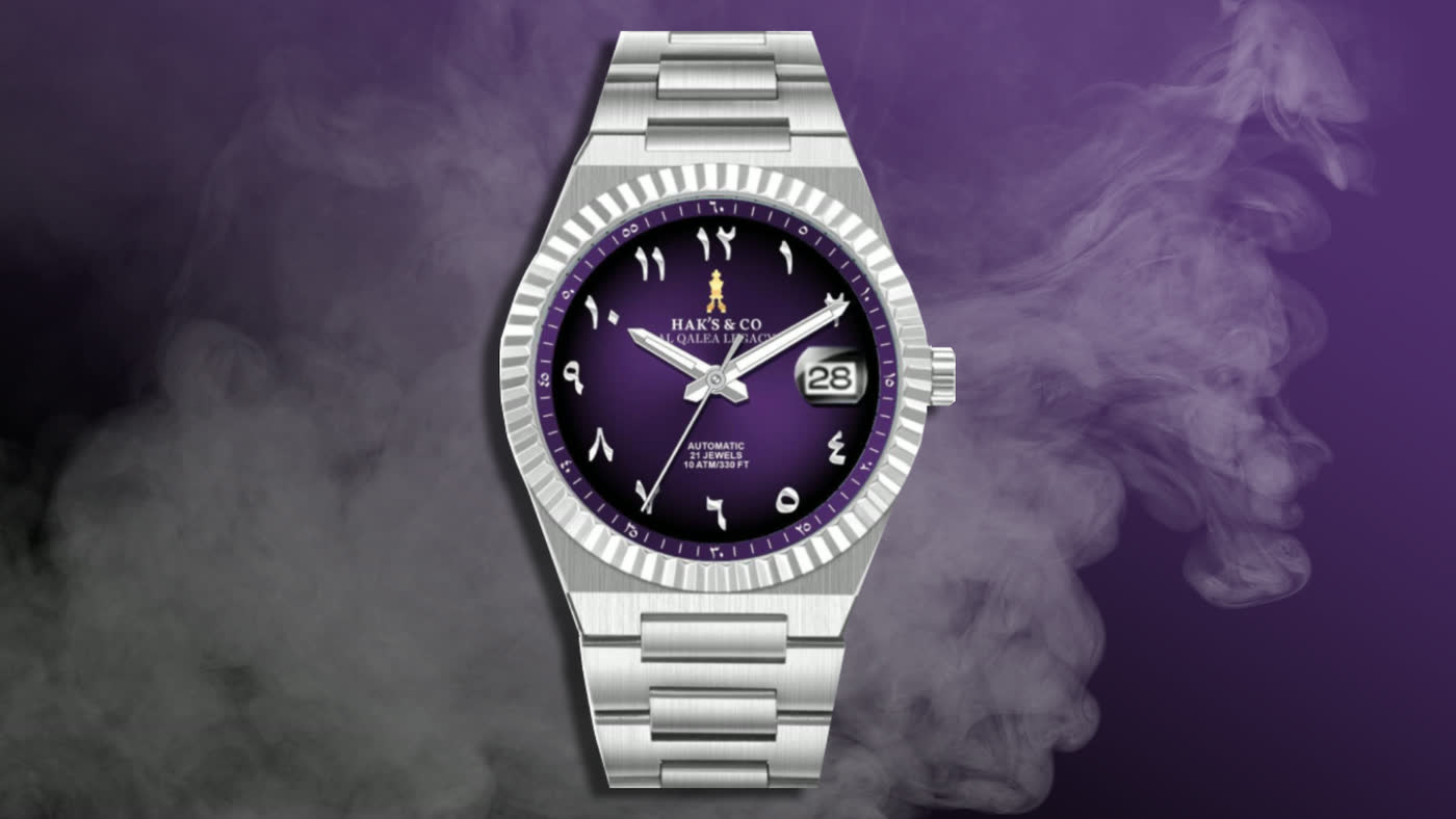 The Al-Qalea: a purple dial with Arabic numerals, against violet smoke